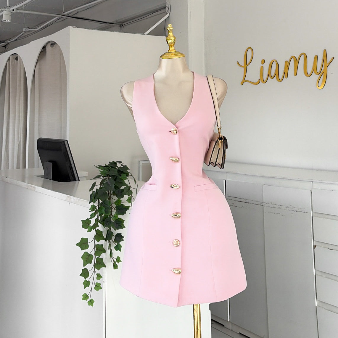 Vestido tipo chaleco botones formas