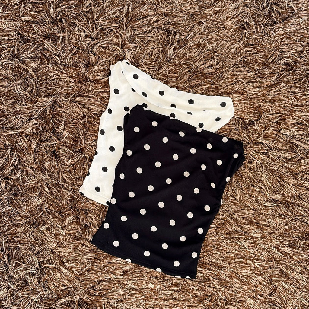 Blusa puntos pecho holgado