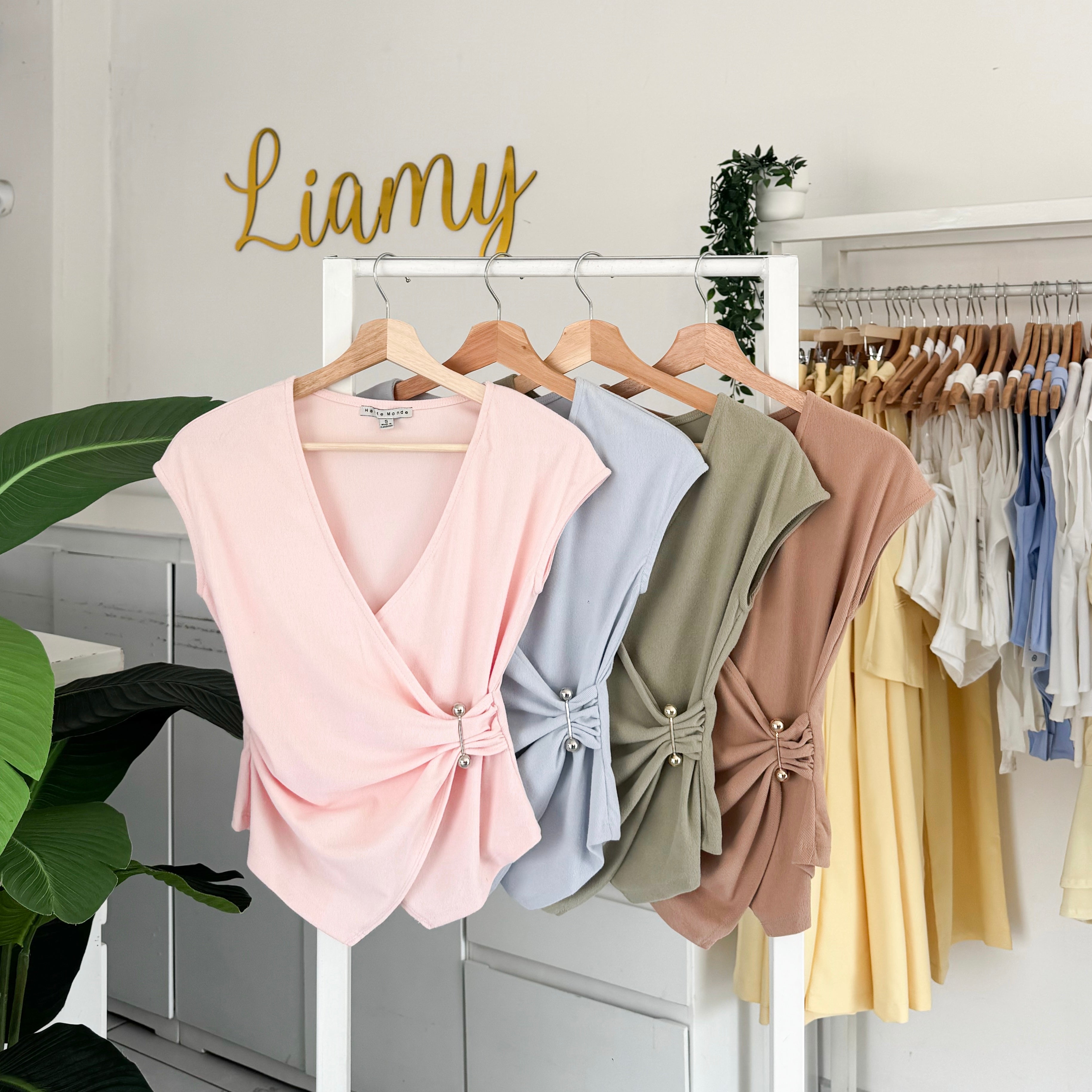 Blusa cruzada alfiler