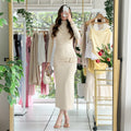 Vestido cuello alto hebillas