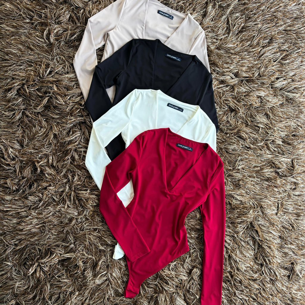 Pantiblusa manga larga “V”
