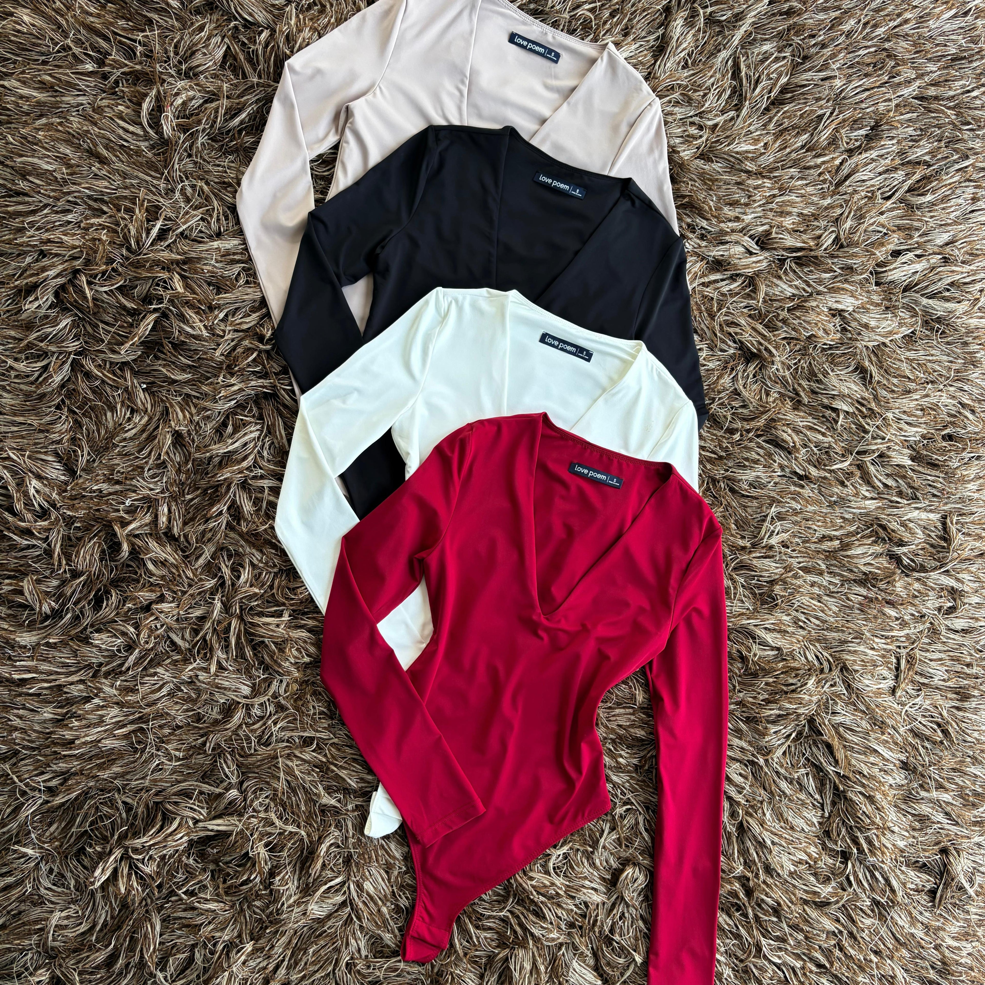 Pantiblusa manga larga “V”