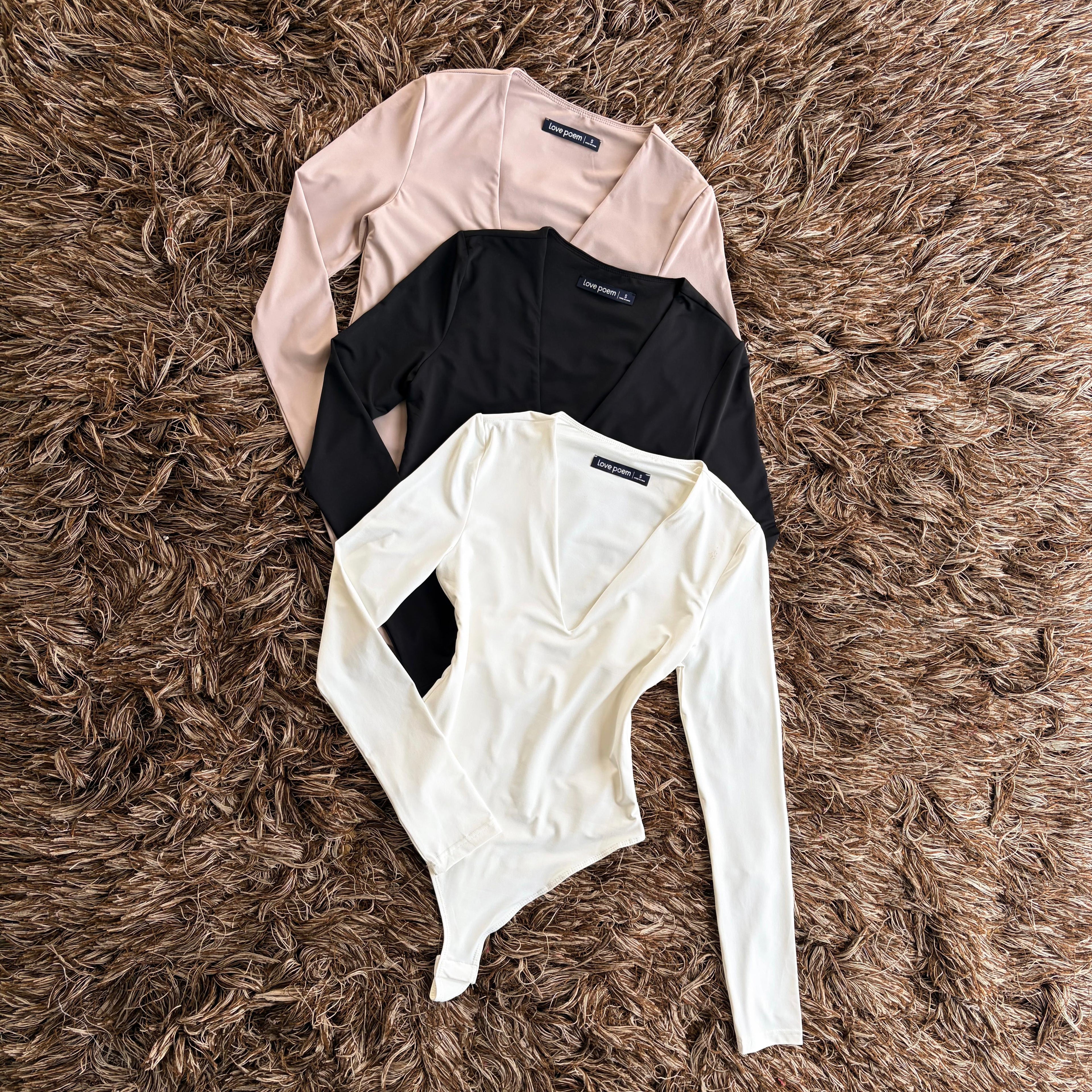 Pantiblusa manga larga “V”